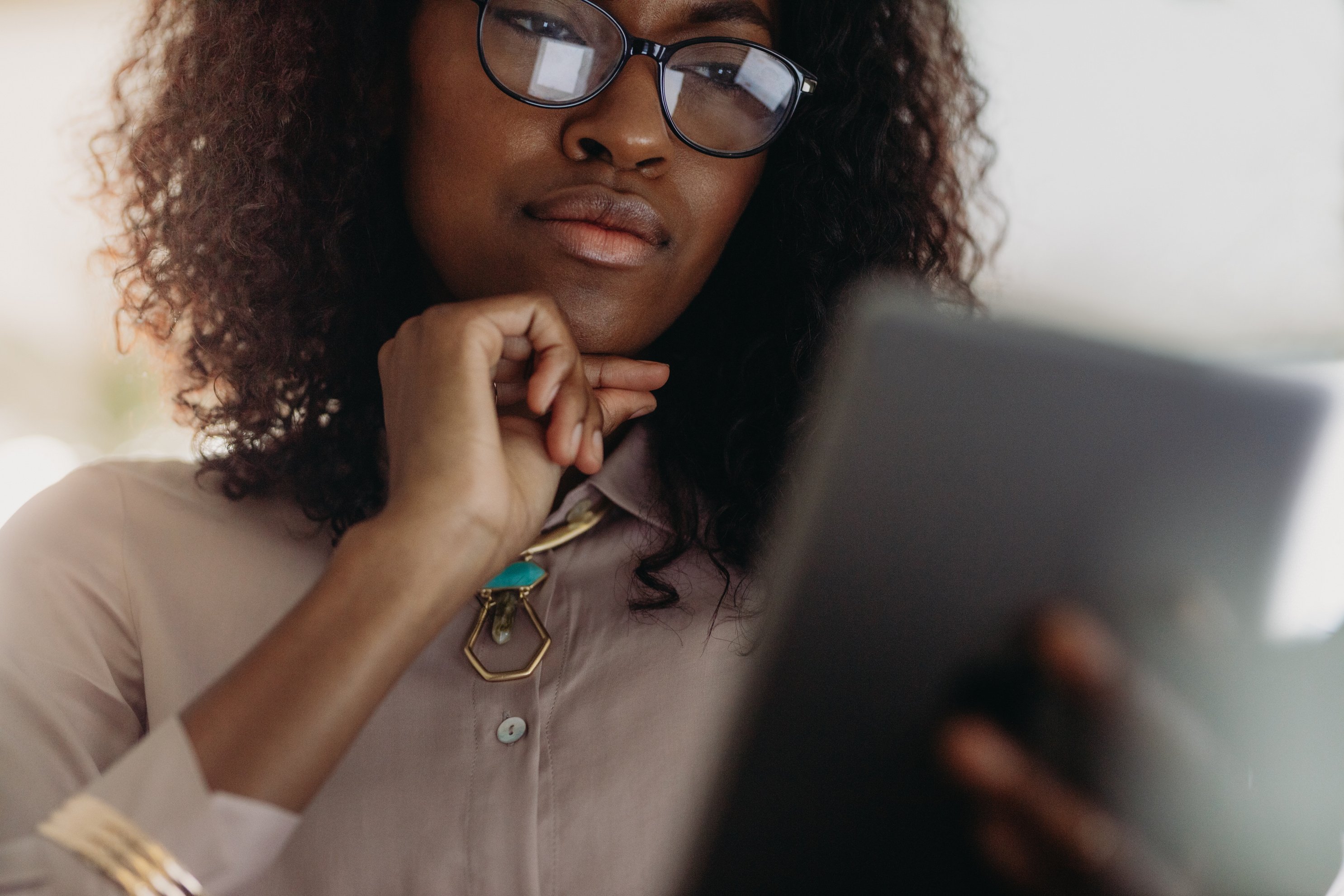 Businesswoman Looking at Tablet Pc